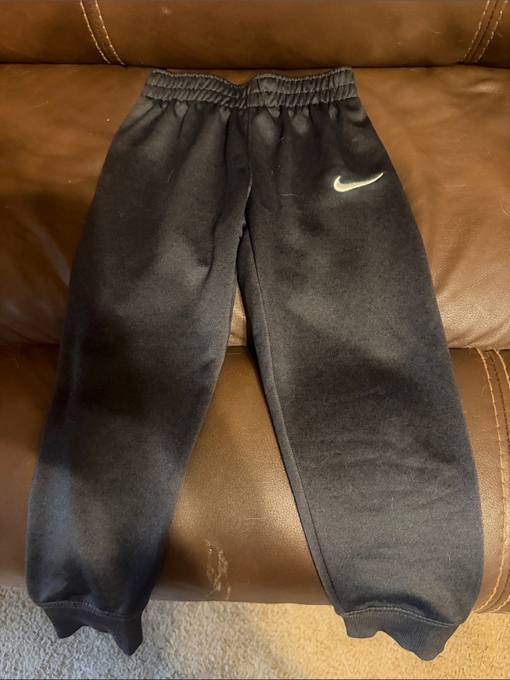 Nike Black Kids Joggers with White Swoosh